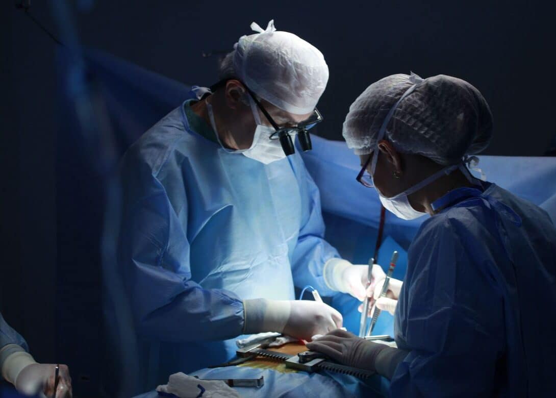 Surgeons perform a procedure on their patient. This surgery could result in fresh human biospecimens, which could be used to fulfill prospective collections.